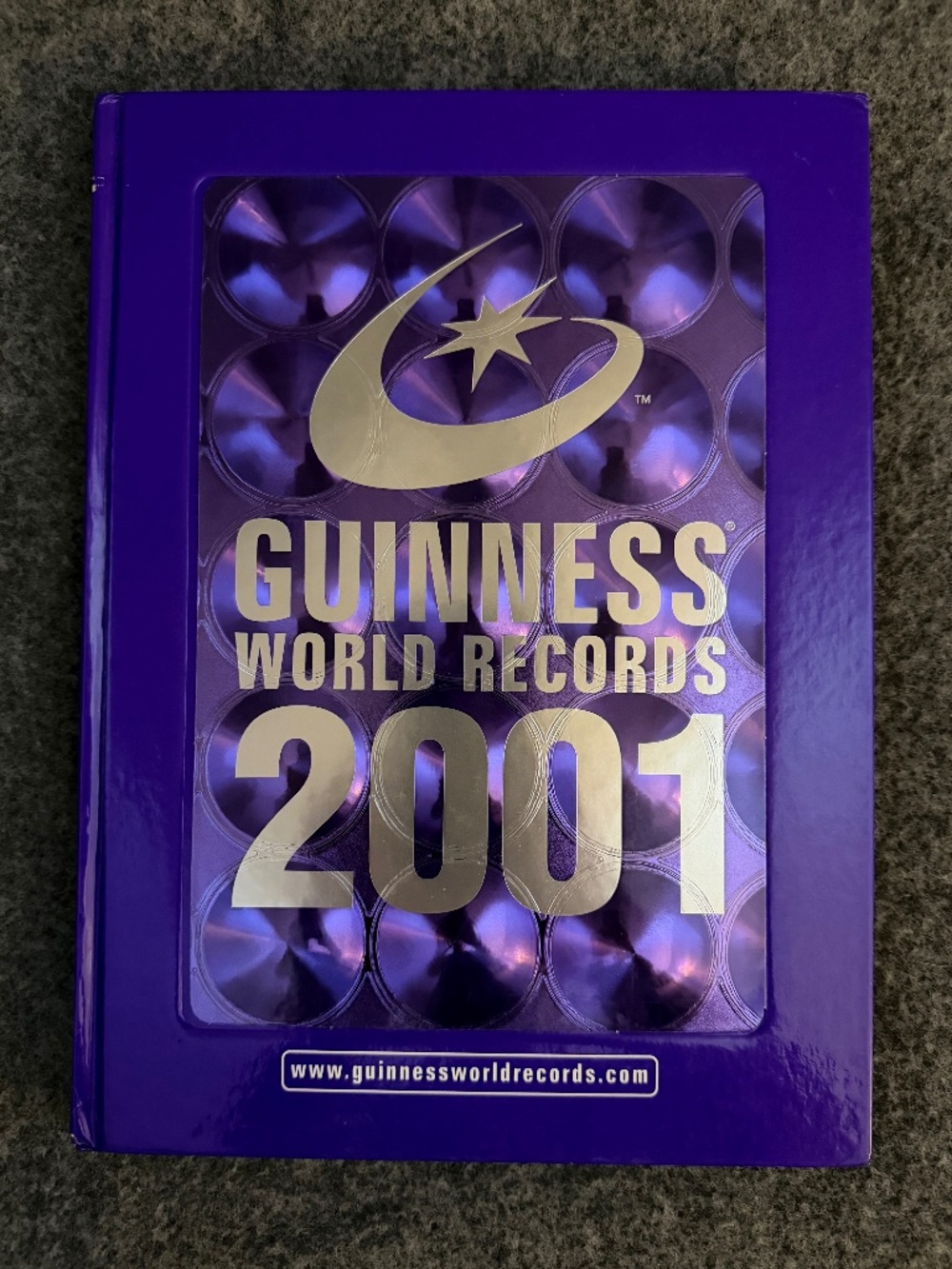 GUINNESS WORLD RECORDS 2001 Purple Hardcover Book